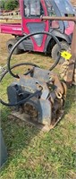Hydraulic packer for an excavator