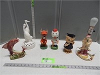 Bobble heads, mid century lamp, flower frogs, and