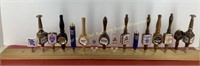 *LPO* 16 Beer Tap handles on display board