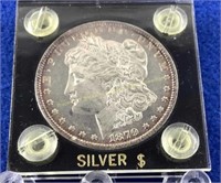 1879-O Morgan silver dollar in case  Edge toneing
