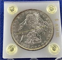 1883 Morgan silver dollar in case  Edge toneing