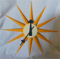 Atomic sunburst resin wall clock, 18" diameter,