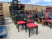 Row of Black Wooden Dinning Padded Chairs