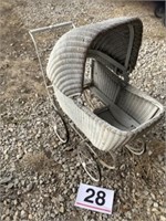 White wicker baby carriage