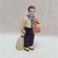 Pioneer Sam - Man Holding Pig - MC - Ceramic