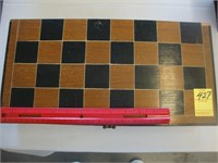 Wooden cased 8" x 16" chess set.