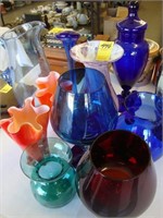 Ten pieces of various colored glass including
