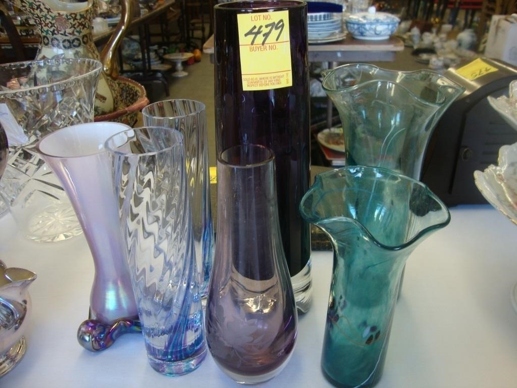 Seven colored art glass vases, 10" and under.