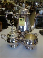 Three-piece silver-plated tea set.