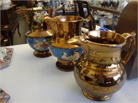 3 TOC copper luster jugs.