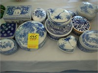 Collection of 13 blue and white porcelain boxes.