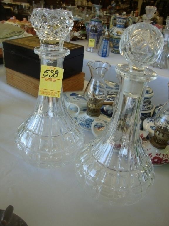 Two 10" crystal decanters.