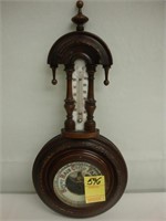 Victorian carved walnut barometer.