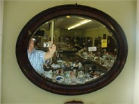 Large oval Edwardian beveled wall mirror, 21” x