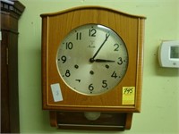 1950’s blonde German wall clock.