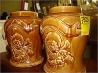 Two TOC brown stone ware tobacco jars with relief
