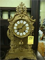 Baroque style brass 8-day mantel clock with