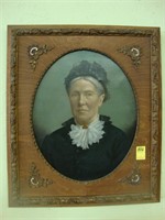 TOC oil on canvas of a woman in oak frame, 23 x