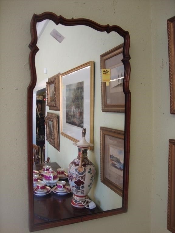Rectangular Queen Anne shaped walnut wall mirror,