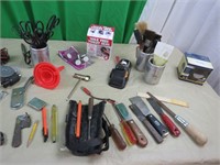 Leather tool pouch, paint brushes, scissors,