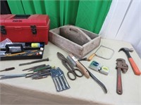 Tool box , coping saw, hammer, wire brush, pipe