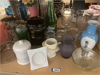 shelf of misc. vases, pitcher,bottle , canister, r