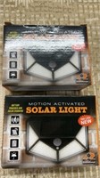2 motion activated solar lights