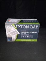 Hampton Bay Exhaust Fan with humidity sensing.