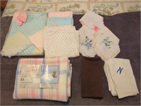 Lot of baby blankets and men and women's