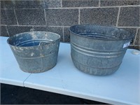 Two-piece galvanized wash tubs. 17.5 in and 14-in