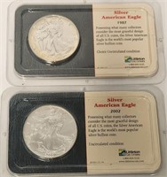 279 - 1987 & 2002 AM EAGLE SILVER DOLLARS (94)