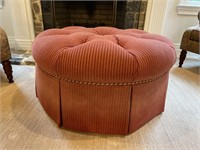 Large upholstered and tufted ottoman