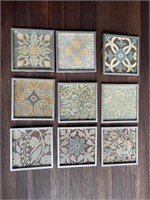 Nine decorative framed composition tiles