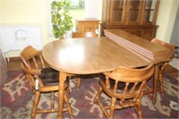Wooden Dining Room Table w/ Four Chairs & Leaves