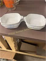 4 small Corning dishes.