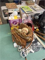 Baseball gloves, tools, light bulbs and lot