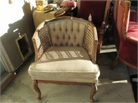 Mid-20th C upholstered arm chair w/ cane sides