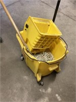 Rolling mop bucket with mop