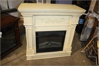 Large fireplace mantel with electric insert