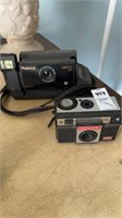 Polaroid and magimatic cameras