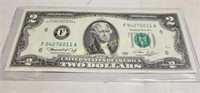 gem uncirculated 1976 FRN canceled with stamp $2