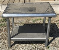 Stainless steel table 30” x 24” x 23 1/2”