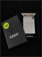 NIB Zippo lighter.