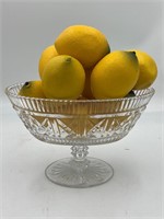 9 lemons in glass bowl