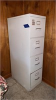 4 drawer file cabinet 
25”D x 15”W x 53” H