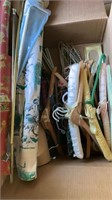 Wrapping paper, clothes, hangers, curtain rods,