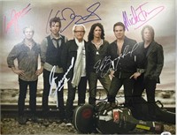 Band Foreigner Signed 11x14 with COA