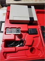 NES with Red Carry Case and 3 Games