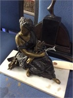 Sitting woman bronze sculpture