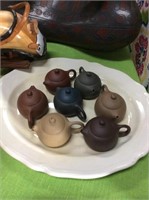 Set of seven vintage clay pots